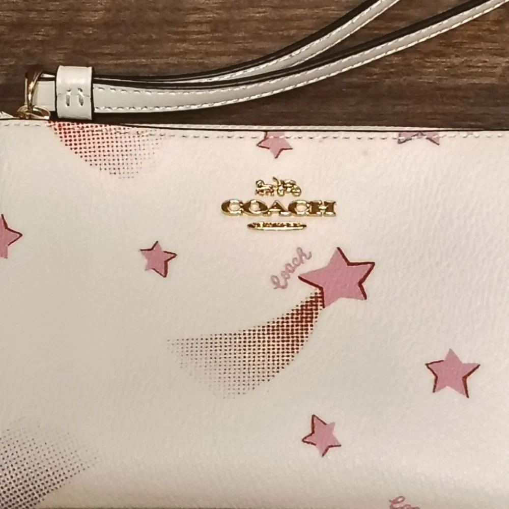 Like New COACH Shooting Stars & Logo Zip Wristlet Pouch
